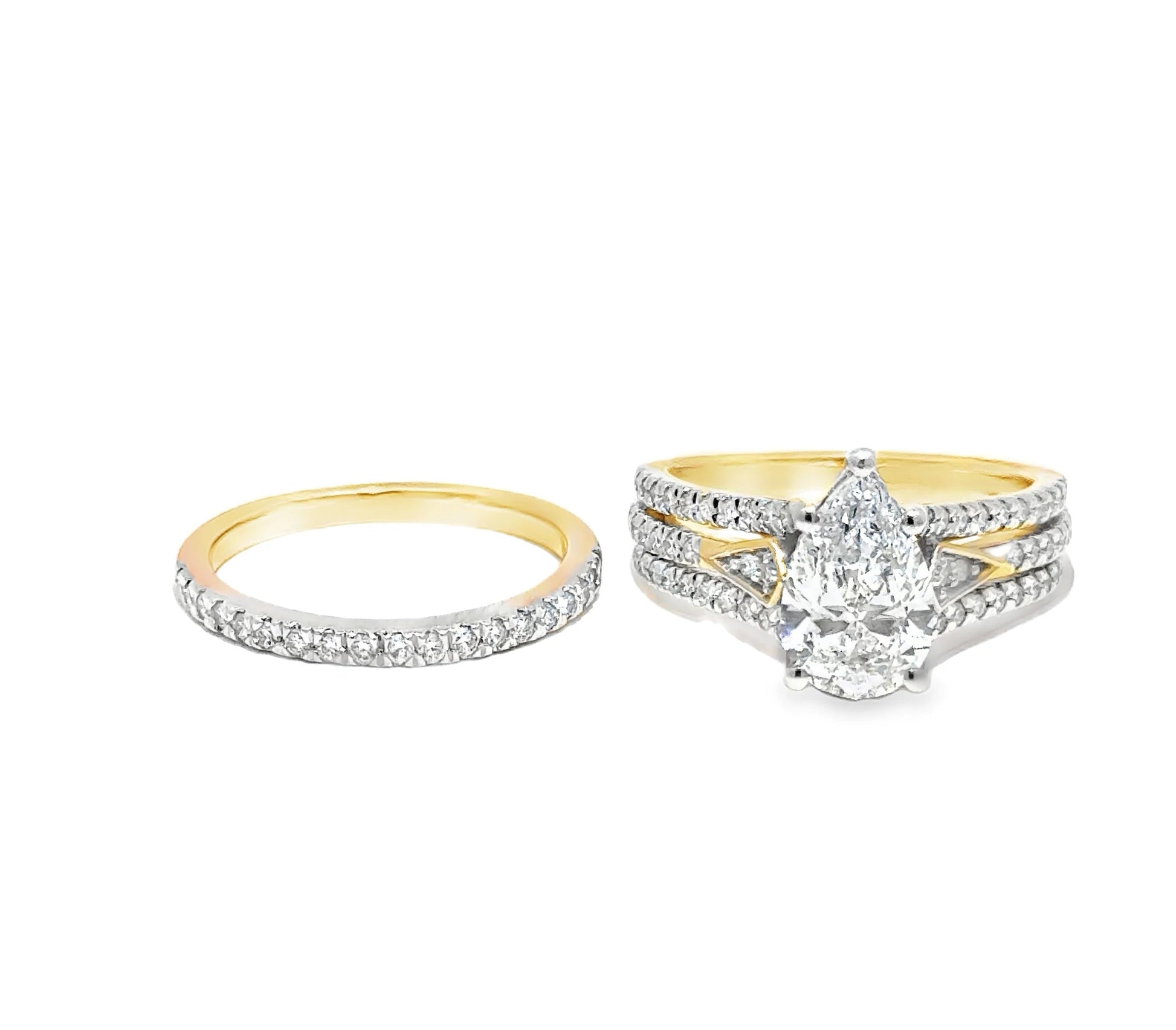 Two diamond rings, one gold and one with a pear-shaped center stone, on a white background.