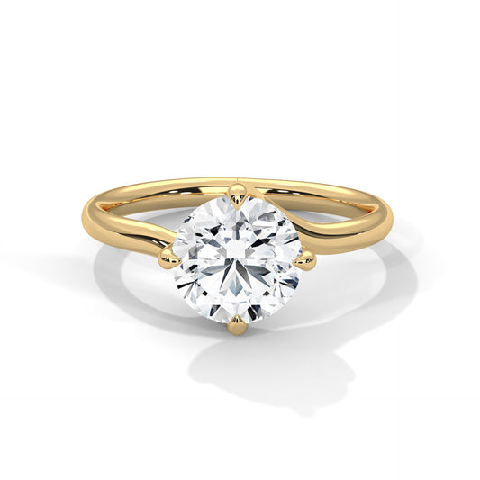 2.00ct round center stone with gold setting.