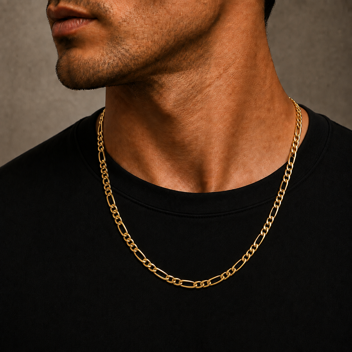 Yellow gold Figaro chain