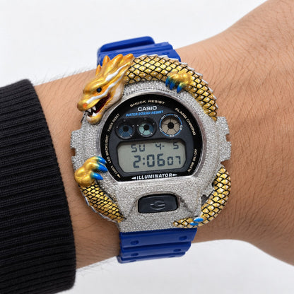 Iced out moissanite G-Shock DW-6900 watch with dragon bezel and blue band – custom iced G-Shock DW-6900