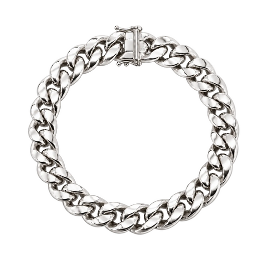 A silver-toned chunky curb link chain bracelet with a rectangular clasp, shown on a plain white background.